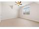 Bright bedroom features a large window with natural light and neutral carpet at 6020 Cochran Mill Rd, Chattahoochee Hills, GA 30268