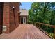 Spacious wood deck, attached to the house, overlooking serene wooded surroundings, great for outdoor living at 6020 Cochran Mill Rd, Chattahoochee Hills, GA 30268