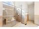 Large glass shower with bench seat, shower head and tile surround at 6020 Cochran Mill Rd, Chattahoochee Hills, GA 30268