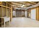 Unfinished basement with exposed beams and concrete flooring, offering potential for customization at 6020 Cochran Mill Rd, Chattahoochee Hills, GA 30268