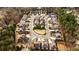 Aerial shot of the neighborhood showcasing a quiet residential area surrounded by lush trees at 1250 Atherton Park, Roswell, GA 30076