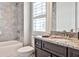 Bathroom featuring granite countertops, tiled walls, and modern fixtures at 1250 Atherton Park, Roswell, GA 30076