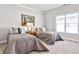 Cozy bedroom featuring two twin beds with gray bedding and a nightstand with a lamp at 1250 Atherton Park, Roswell, GA 30076