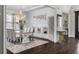 Bright dining room featuring modern chandelier, table, and elegant decor, perfect for Gathering gatherings at 1250 Atherton Park, Roswell, GA 30076