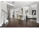 Bright foyer featuring hardwood floors, soaring ceilings, and elegant access to the living and dining areas at 1250 Atherton Park, Roswell, GA 30076