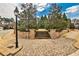 Beautifully landscaped walkway with brick features, leading to a serene and inviting property entrance at 1250 Atherton Park, Roswell, GA 30076