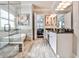 Luxurious main bathroom with a bathtub, a walk-in shower and and sinks at 1250 Atherton Park, Roswell, GA 30076