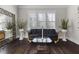 Comfortable sitting area featuring hardwood floors, unique decorations, and lots of natural light at 1250 Atherton Park, Roswell, GA 30076