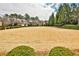 Expansive front yard showcases the lush greenery and beautiful homes in the neighborhood at 1250 Atherton Park, Roswell, GA 30076