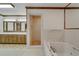 Spacious bathroom with double vanity, shower, and large bathtub at 3781 Anneewakee Rd, Douglasville, GA 30135