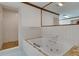 Bathroom with a large bathtub and shower at 3781 Anneewakee Rd, Douglasville, GA 30135