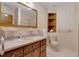 Updated bathroom with a vanity, toilet and shower at 3781 Anneewakee Rd, Douglasville, GA 30135