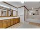 Large bathroom with double vanity and bathtub at 3781 Anneewakee Rd, Douglasville, GA 30135