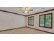 Bright bedroom with ceiling fan and large windows at 3781 Anneewakee Rd, Douglasville, GA 30135