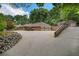 This property features an expansive driveway leading to a three-car garage and a separate parking area at 3781 Anneewakee Rd, Douglasville, GA 30135