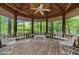 Gazebo interior with ceiling fan and wooded views at 3781 Anneewakee Rd, Douglasville, GA 30135