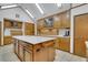 Spacious kitchen with island and abundant wood cabinetry at 3781 Anneewakee Rd, Douglasville, GA 30135
