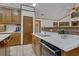 Updated kitchen with white countertops and wood cabinets at 3781 Anneewakee Rd, Douglasville, GA 30135