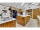 Spacious kitchen with island, stainless steel appliances, and ample cabinetry at 3781 Anneewakee Rd, Douglasville, GA 30135