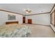 Main bedroom with dresser and floral bedding at 3781 Anneewakee Rd, Douglasville, GA 30135
