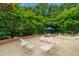 Expansive patio with outdoor seating, perfect for entertaining or relaxing in nature at 3781 Anneewakee Rd, Douglasville, GA 30135