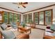Sunroom with ample natural light and comfortable seating at 3781 Anneewakee Rd, Douglasville, GA 30135