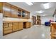 Well-lit workshop with built-in cabinetry and workspace at 3781 Anneewakee Rd, Douglasville, GA 30135