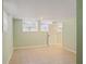 Finished basement room with tiled floor and windows at 3343 Charlemagne Dr, Decatur, GA 30034