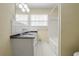 Bathroom with double vanity and hexagon tile floor at 3343 Charlemagne Dr, Decatur, GA 30034