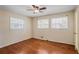 Bright bedroom with hardwood floors and multiple windows at 3343 Charlemagne Dr, Decatur, GA 30034