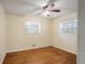 Spacious bedroom with hardwood floors and ceiling fan at 3343 Charlemagne Dr, Decatur, GA 30034