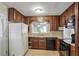 Galley kitchen with granite countertops and ample cabinet space at 3343 Charlemagne Dr, Decatur, GA 30034