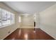 Bright living room featuring hardwood floors and a view of the front yard at 3343 Charlemagne Dr, Decatur, GA 30034