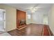 Spacious living room with brick fireplace and hardwood floors at 3343 Charlemagne Dr, Decatur, GA 30034
