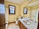 Full bathroom with shower/tub combo, toilet and vanity at 5615 Pennybrook Ct, Stone Mountain, GA 30087