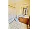 Bathroom with a shower/tub combo, toilet, and vanity at 5615 Pennybrook Ct, Stone Mountain, GA 30087