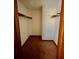 Large walk-in closet with wood shelving at 5615 Pennybrook Ct, Stone Mountain, GA 30087