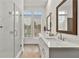 Bright bathroom boasts double vanity, large shower, and abundant natural light at 137 Devore Rd, Alpharetta, GA 30009