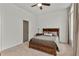 Cozy bedroom with large windows and ceiling fan at 137 Devore Rd, Alpharetta, GA 30009