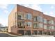 Brick townhouses with private garages and balconies at 137 Devore Rd, Alpharetta, GA 30009