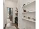 Bright hallway with built-in shelving and wood-look floors at 137 Devore Rd, Alpharetta, GA 30009