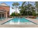 Community swimming pool with plenty of lounge chairs at 137 Devore Rd, Alpharetta, GA 30009