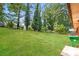 Large backyard with lush green grass and trees at 3141 Bellgreen Way, Decatur, GA 30032