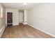 Finished basement room with wood-look flooring and storage at 3141 Bellgreen Way, Decatur, GA 30032