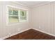 Charming bedroom with hardwood floors and wainscoting at 3141 Bellgreen Way, Decatur, GA 30032