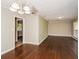 Simple dining room with hardwood floors and neutral walls at 3141 Bellgreen Way, Decatur, GA 30032