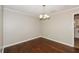 Dining room with hardwood floors and a light fixture at 3141 Bellgreen Way, Decatur, GA 30032