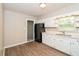Kitchen with white cabinets and modern appliances at 3141 Bellgreen Way, Decatur, GA 30032