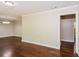 Hardwood floor living room with neutral walls at 3141 Bellgreen Way, Decatur, GA 30032