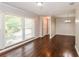 Bright living room with hardwood floors and large windows at 3141 Bellgreen Way, Decatur, GA 30032